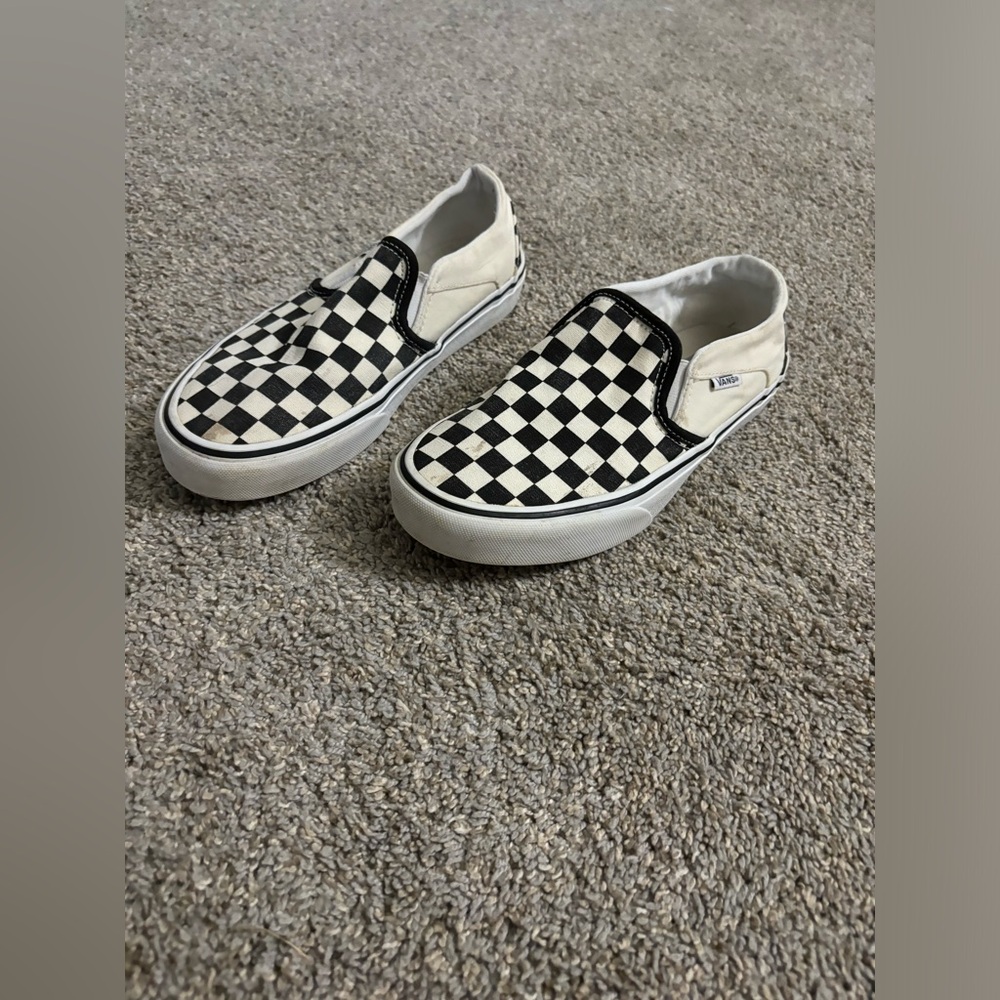 Checkerboard slip on vans